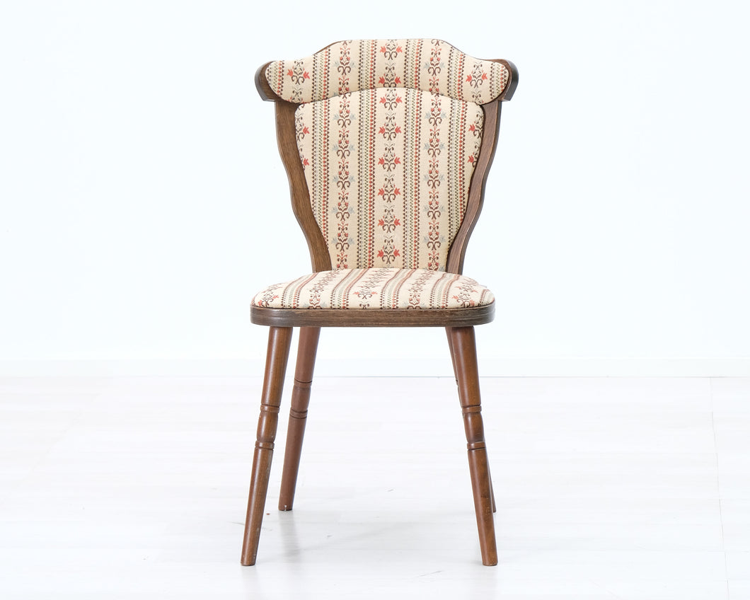 Antiikkinen tuoli kangasistuimella